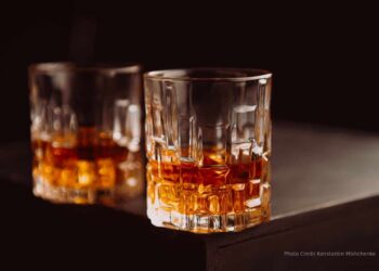 Crystal glasses filled with whiskey